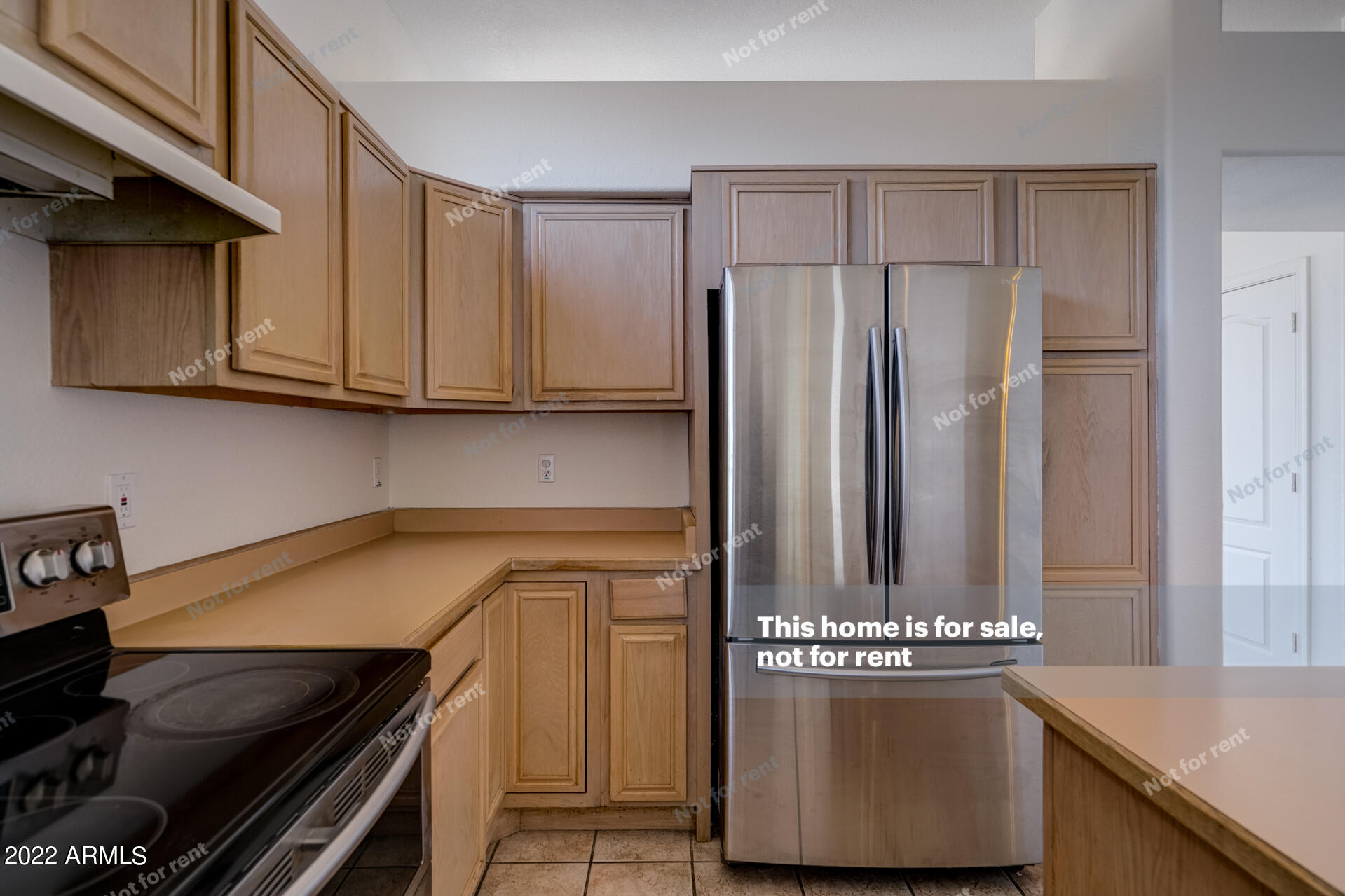 17648 North 17th Street Phoenix, AZ 85022 - Photo 10 of 31 a kitchen with stainless steel appliances granite countertop a stove and a refrigerator