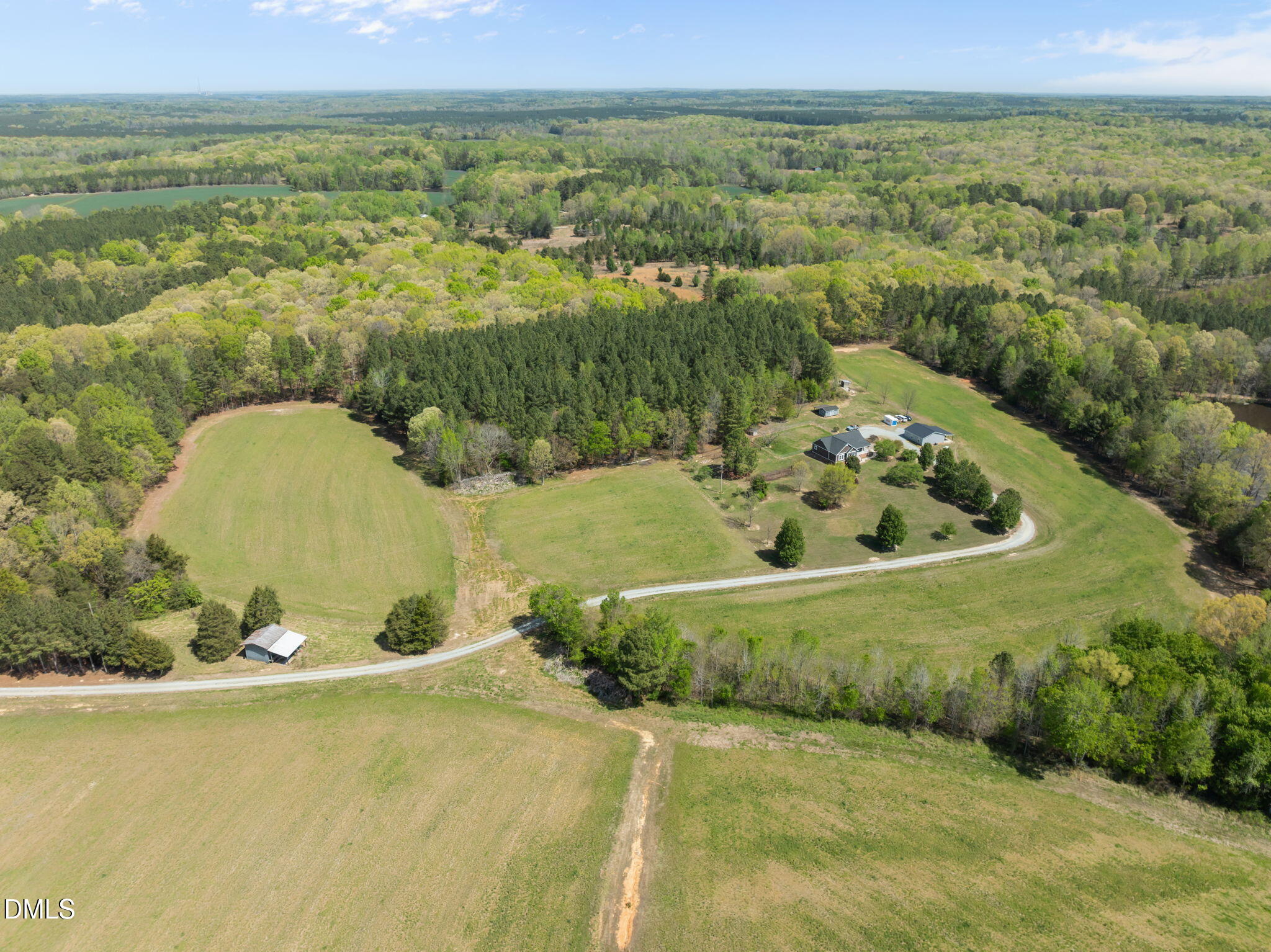 236 Dirgie Mine Road Roxboro, NC 27574 - Photo 2 of 55 a view of a outdoor space and a lake view