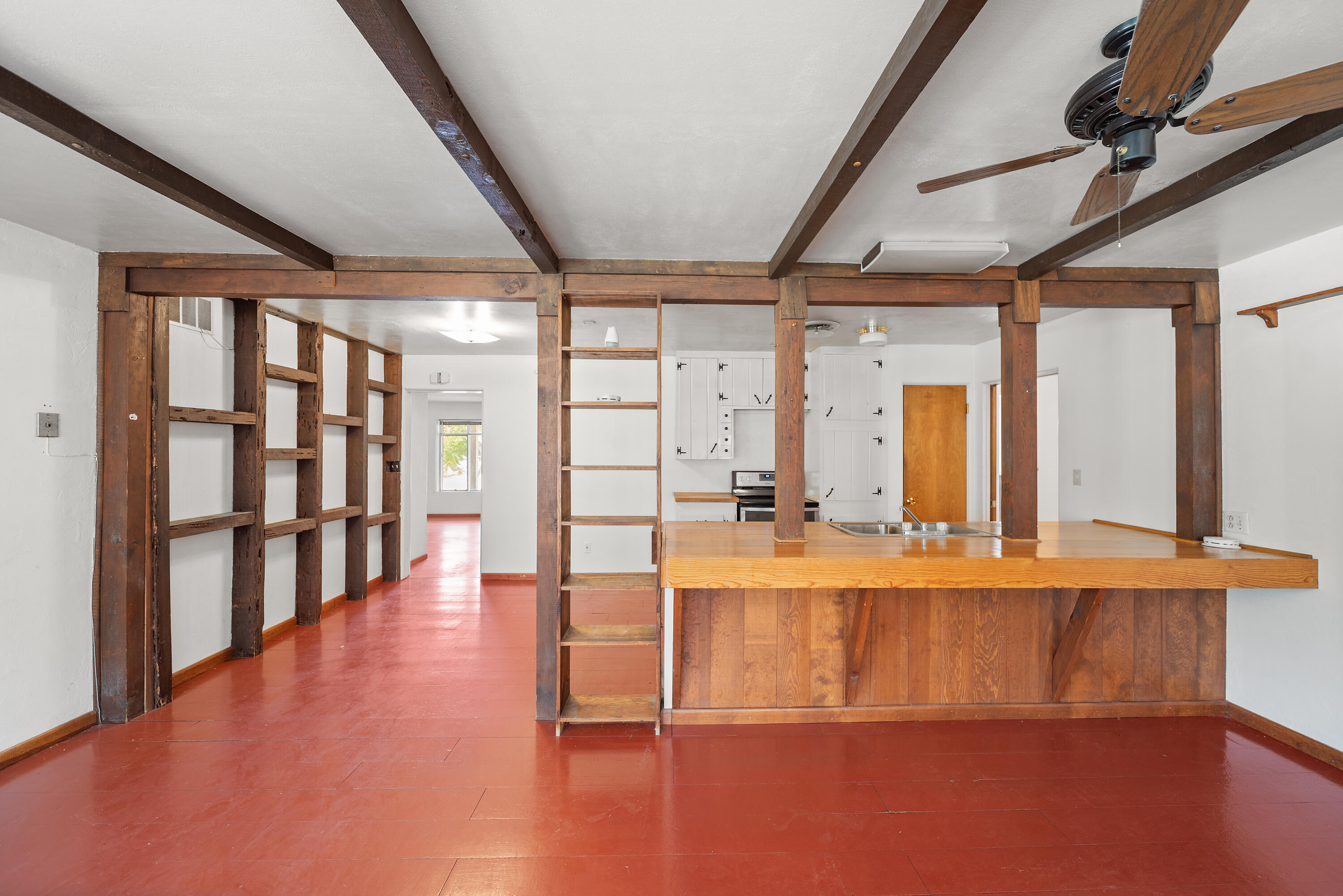 14575 Kinney Avenue Red Bluff, CA 96080 - Photo 12 of 43 a large room with wooden floor