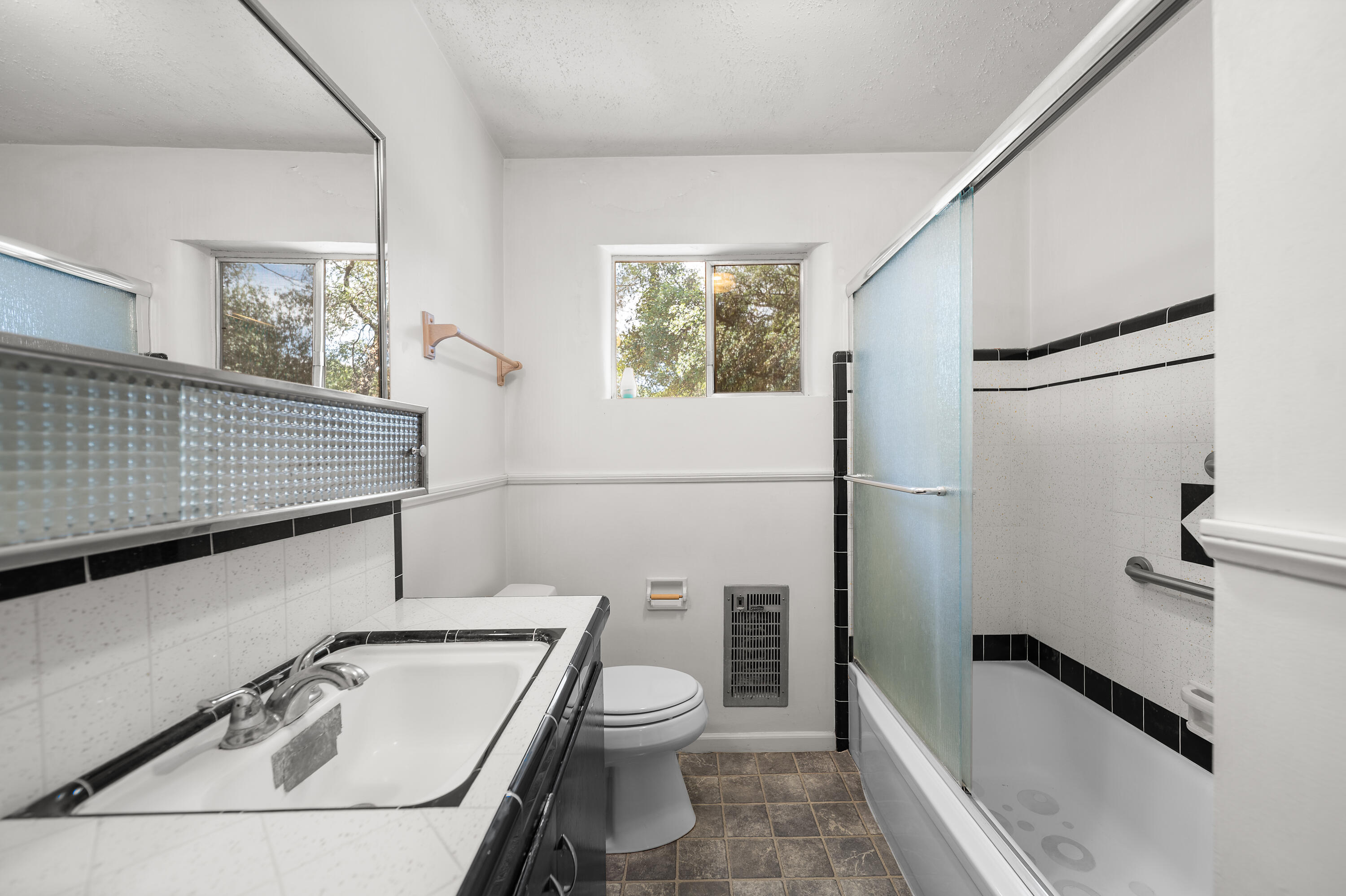 14575 Kinney Avenue Red Bluff, CA 96080 - Photo 17 of 43 a bathroom with a toilet sink and mirror