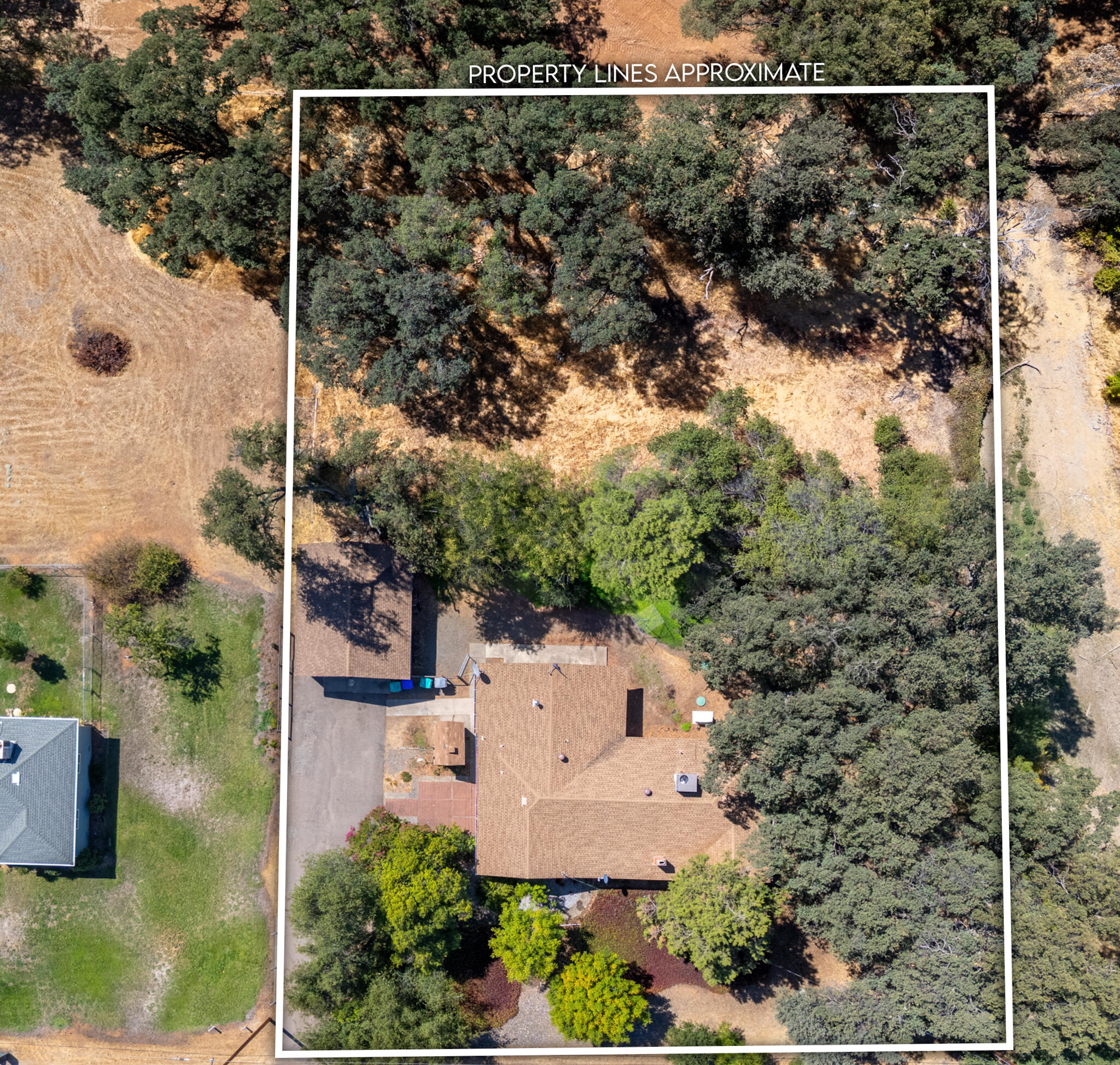 14575 Kinney Avenue Red Bluff, CA 96080 - Photo 2 of 43 an aerial view of a house with a yard