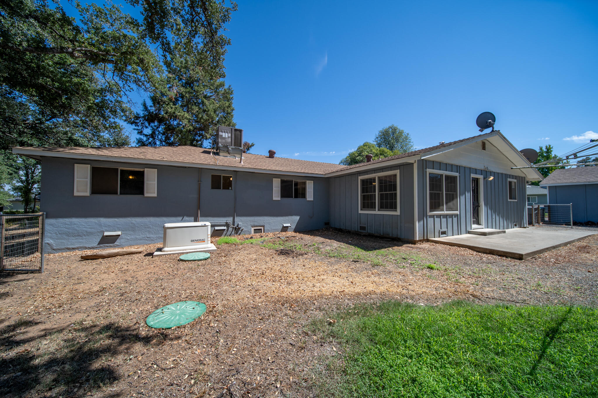 14575 Kinney Avenue Red Bluff, CA 96080 - Photo 30 of 43 a front view of a house with garden