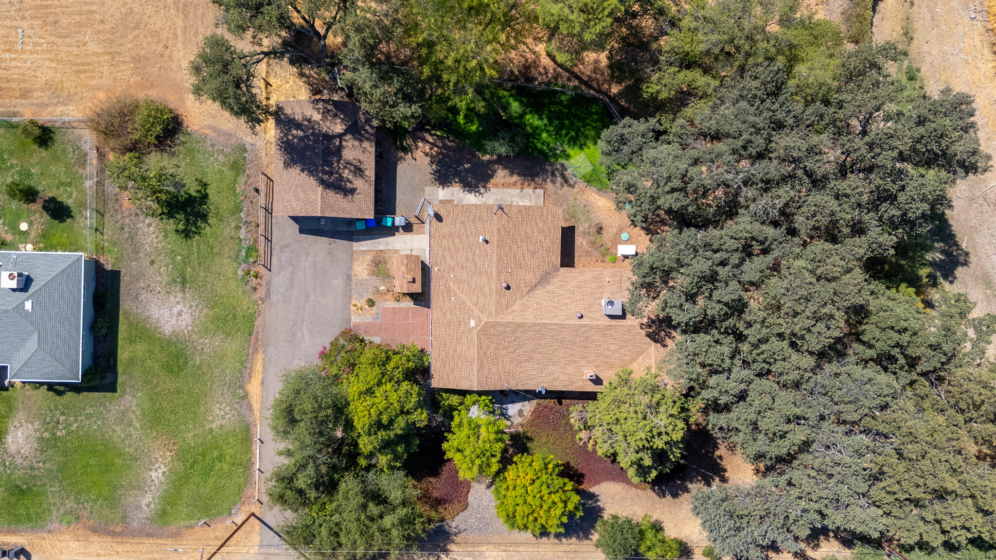 14575 Kinney Avenue Red Bluff, CA 96080 - Photo 43 of 43 an aerial view of a house with a yard basket ball court and outdoor seating