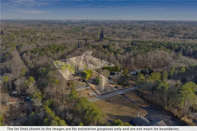an aerial view of residential house and outdoor space