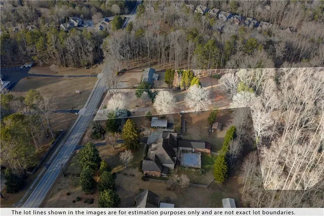 an aerial view of residential house with outdoor space