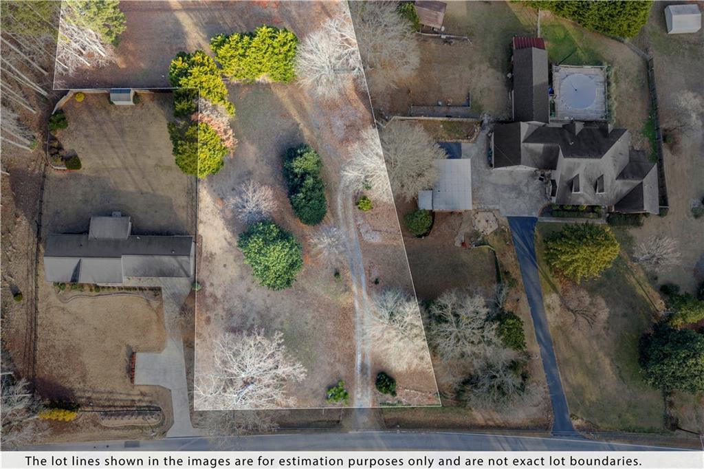 0 South Hurt Road Southwest Smyrna, GA 30082 - Photo 8 of 10 an aerial view of a house with a yard