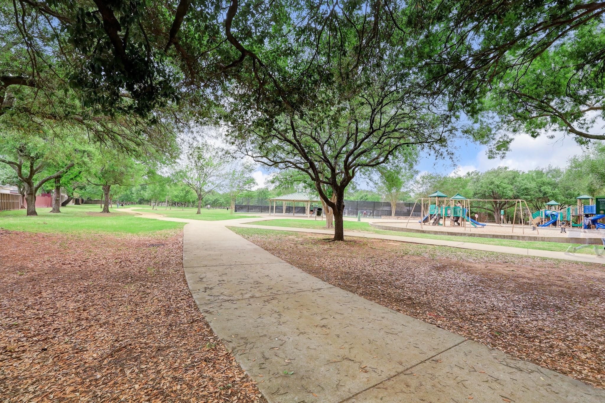7622 Richmond Avenue Houston, TX 77063 - Photo 2 of 9 a view of road with tree
