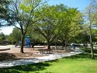 a view of a kitchen with wooden floor