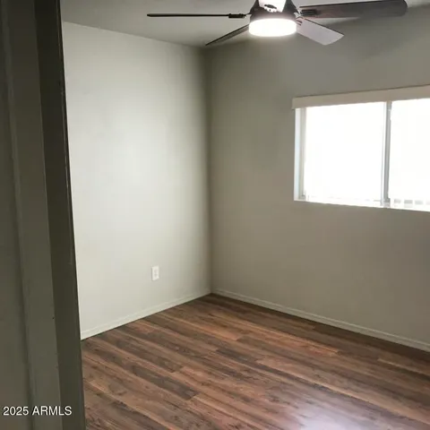 a bathroom with a sink vanity and a mirror