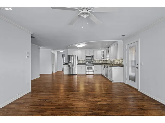 a view of kitchen space with wooden floor