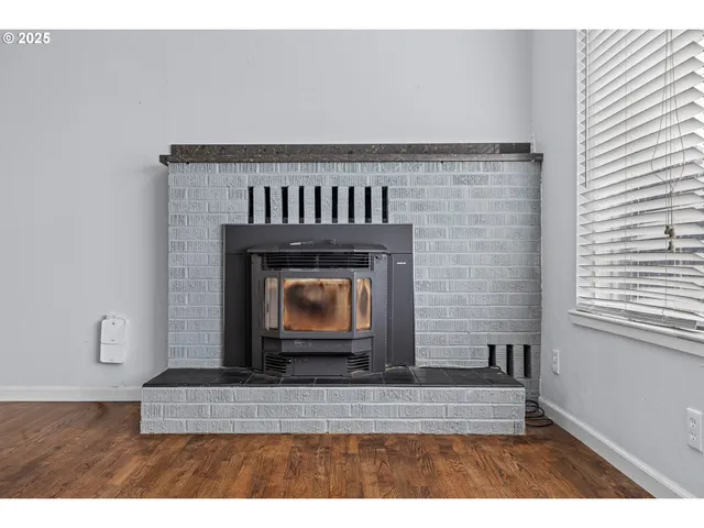 a living room with a fireplace