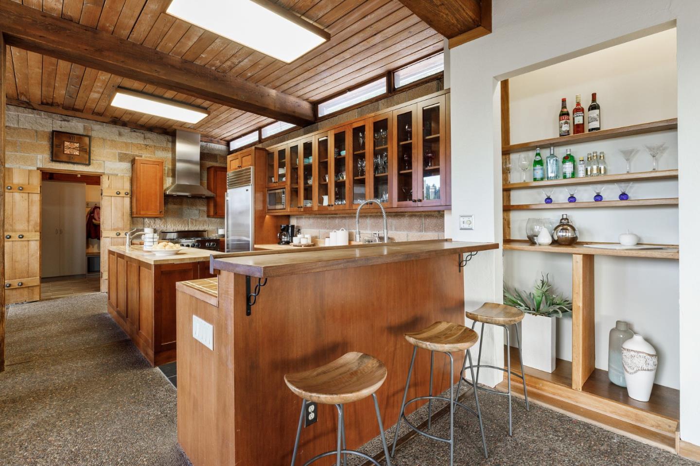 13456 Indian Trail Road Los Gatos, CA 95033 - Photo 25 of 99 a kitchen with furniture a refrigerator and a stove