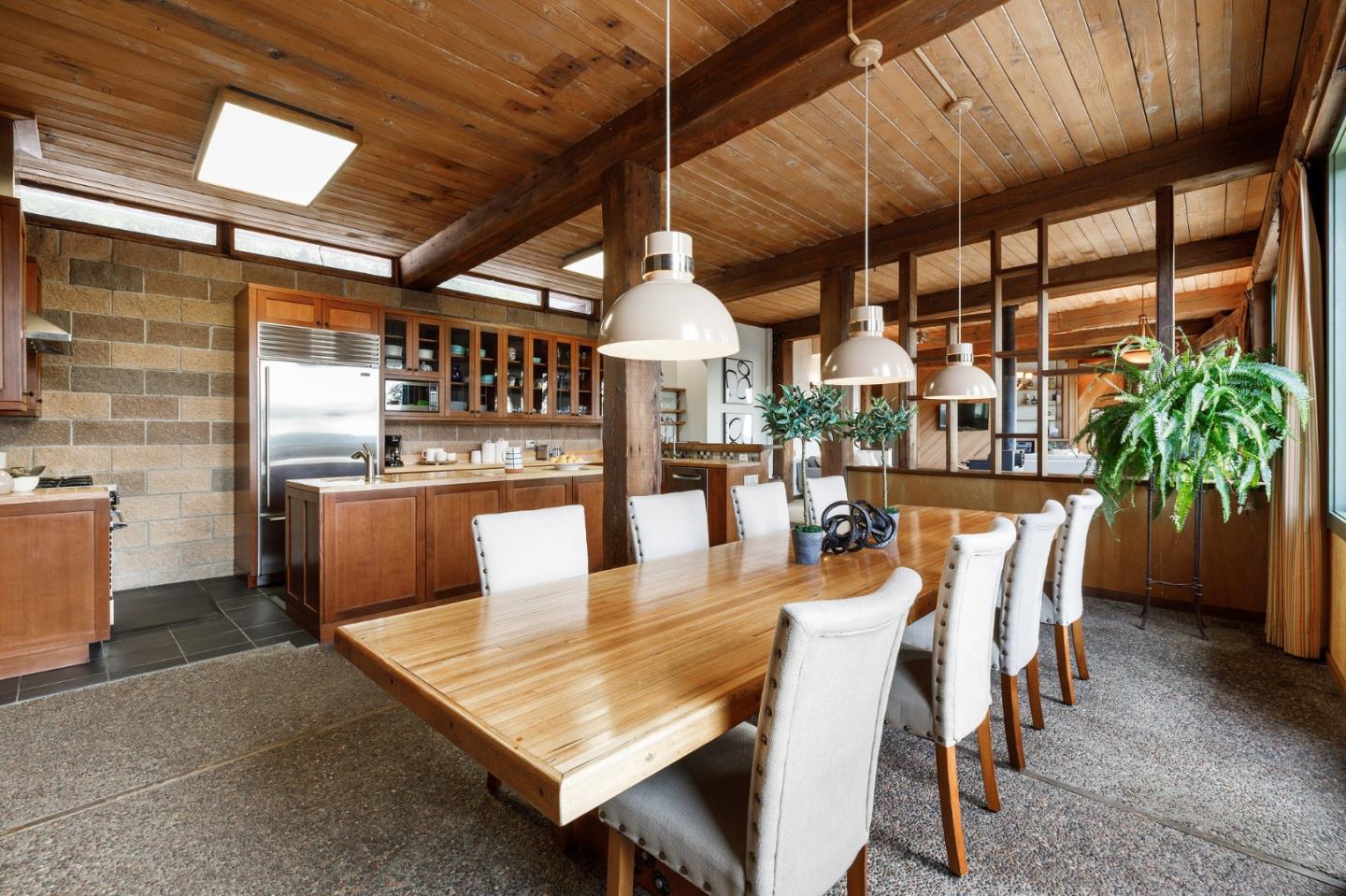 13456 Indian Trail Road Los Gatos, CA 95033 - Photo 26 of 99 a dining room with stainless steel appliances granite countertop a table chairs and a table