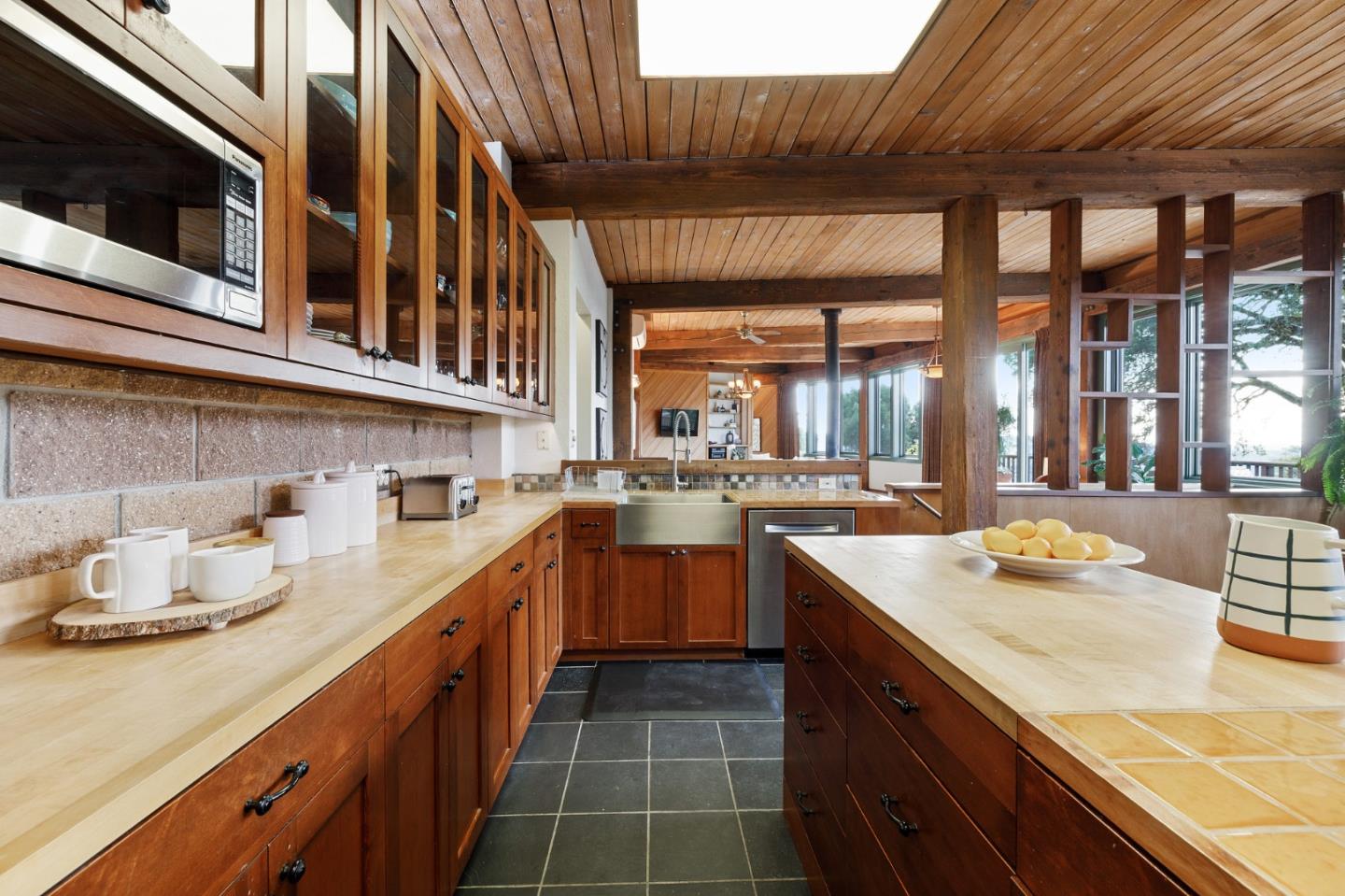 13456 Indian Trail Road Los Gatos, CA 95033 - Photo 29 of 99 a kitchen with a sink and cabinets