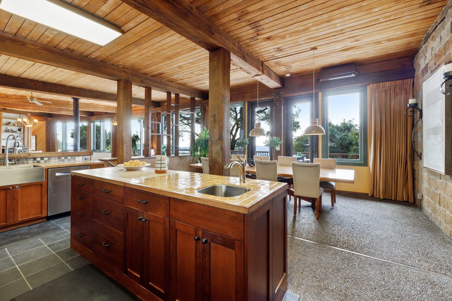 13456 Indian Trail Road Los Gatos, CA 95033 - Photo 30 of 99 a kitchen with a sink and large windows