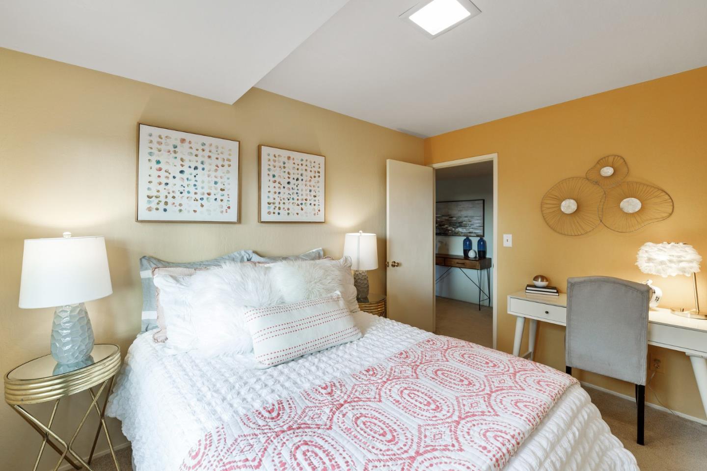 13456 Indian Trail Road Los Gatos, CA 95033 - Photo 56 of 99 a bedroom with a bed and a lamp on dresser