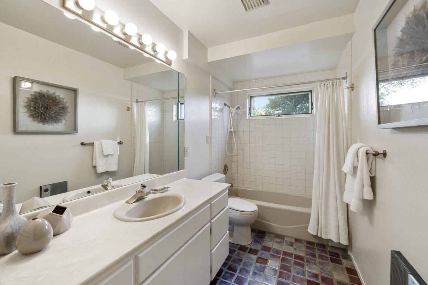 13456 Indian Trail Road Los Gatos, CA 95033 - Photo 57 of 99 a bathroom with a sink toilet and shower