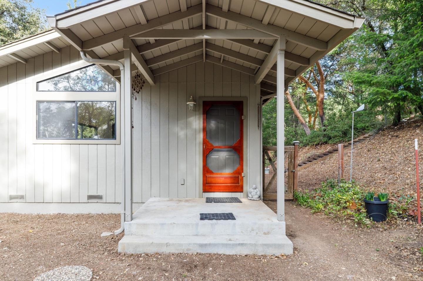 13456 Indian Trail Road Los Gatos, CA 95033 - Photo 84 of 99 a front view of a house with a yard