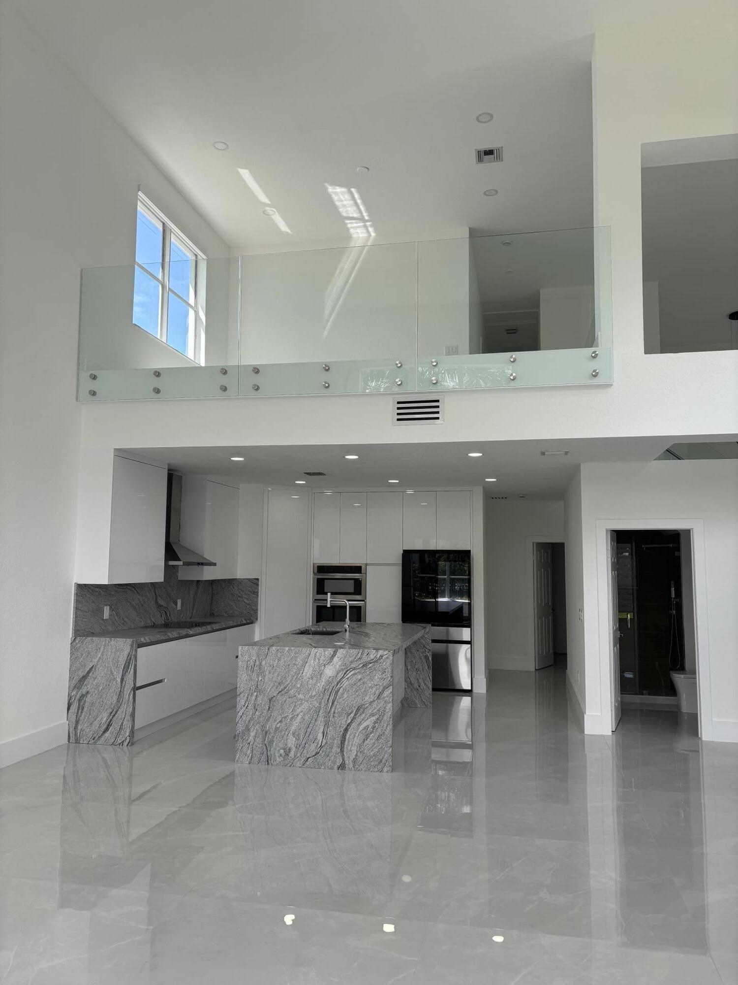 5227 Southwest 195th Terrace Miramar, FL 33029 - Photo 19 of 58 a kitchen with a sink and a fireplace