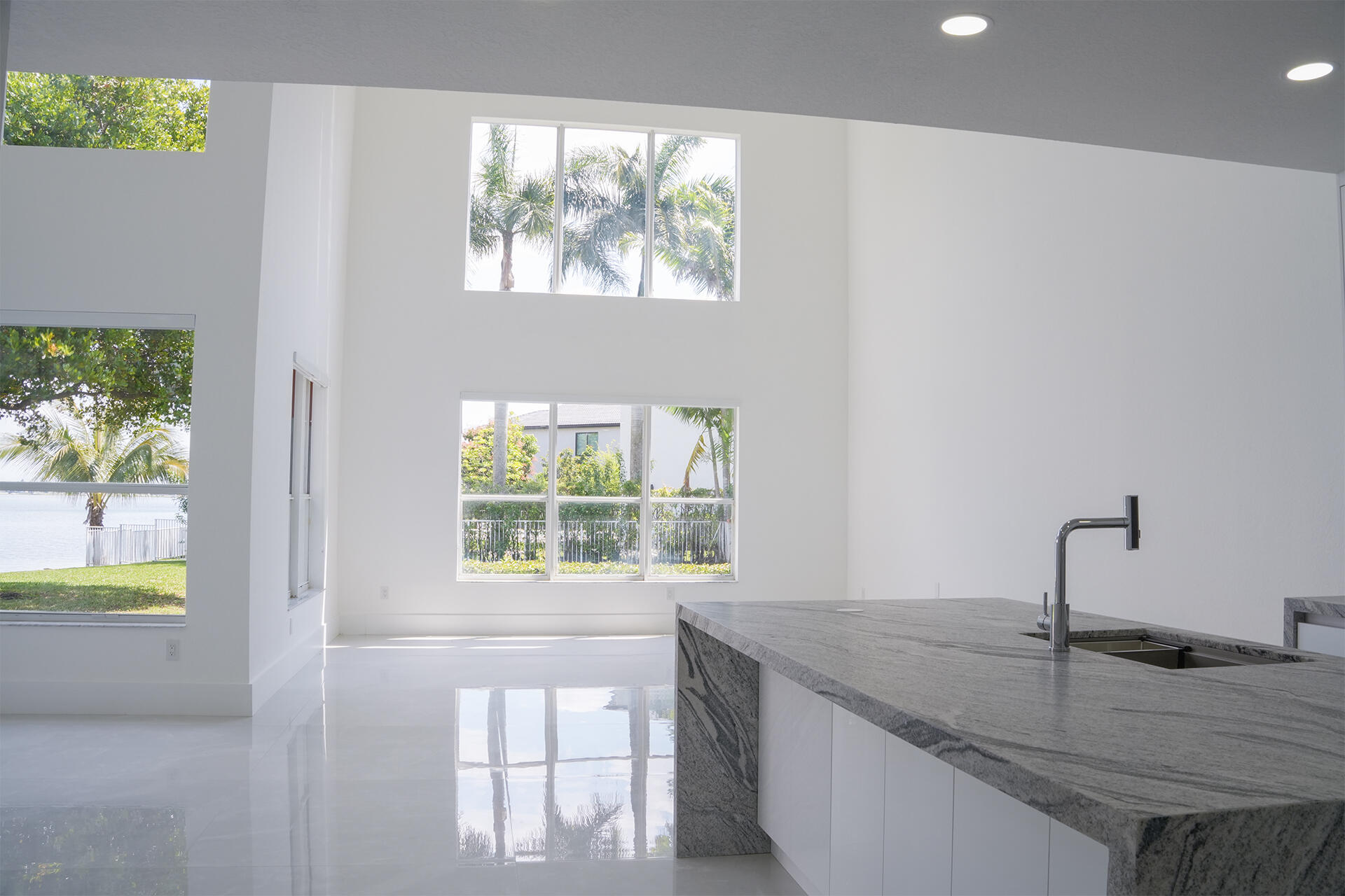 5227 Southwest 195th Terrace Miramar, FL 33029 - Photo 24 of 58 a kitchen with a window a sink and a counter top space