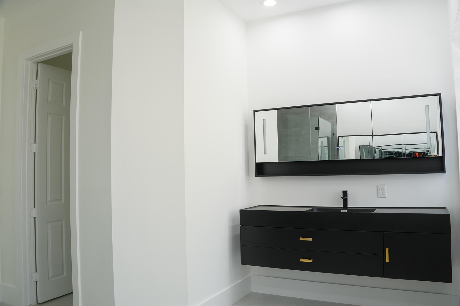 5227 Southwest 195th Terrace Miramar, FL 33029 - Photo 33 of 58 a bathroom with a sink and a mirror