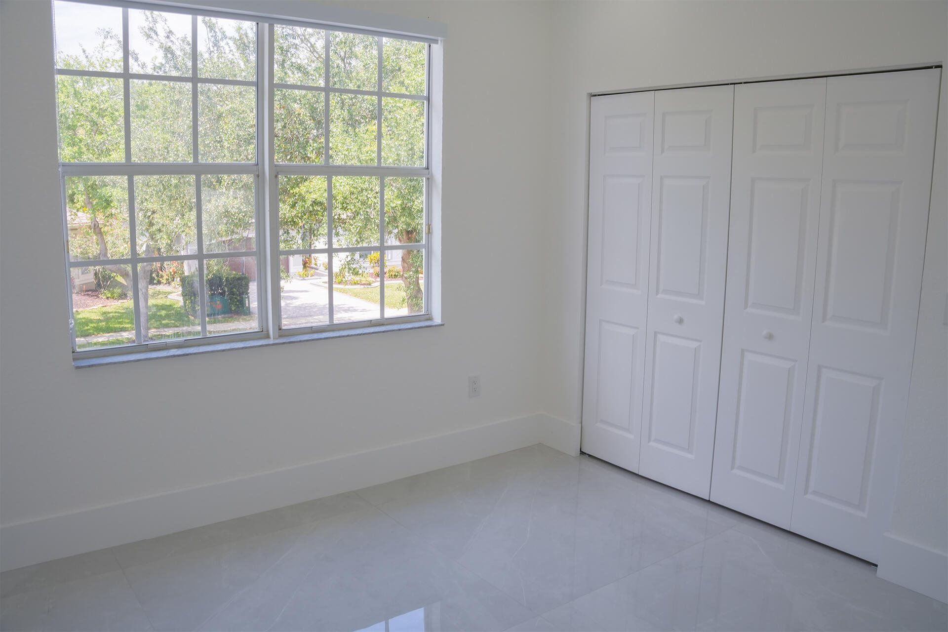 5227 Southwest 195th Terrace Miramar, FL 33029 - Photo 50 of 58 a view of an empty room with a window