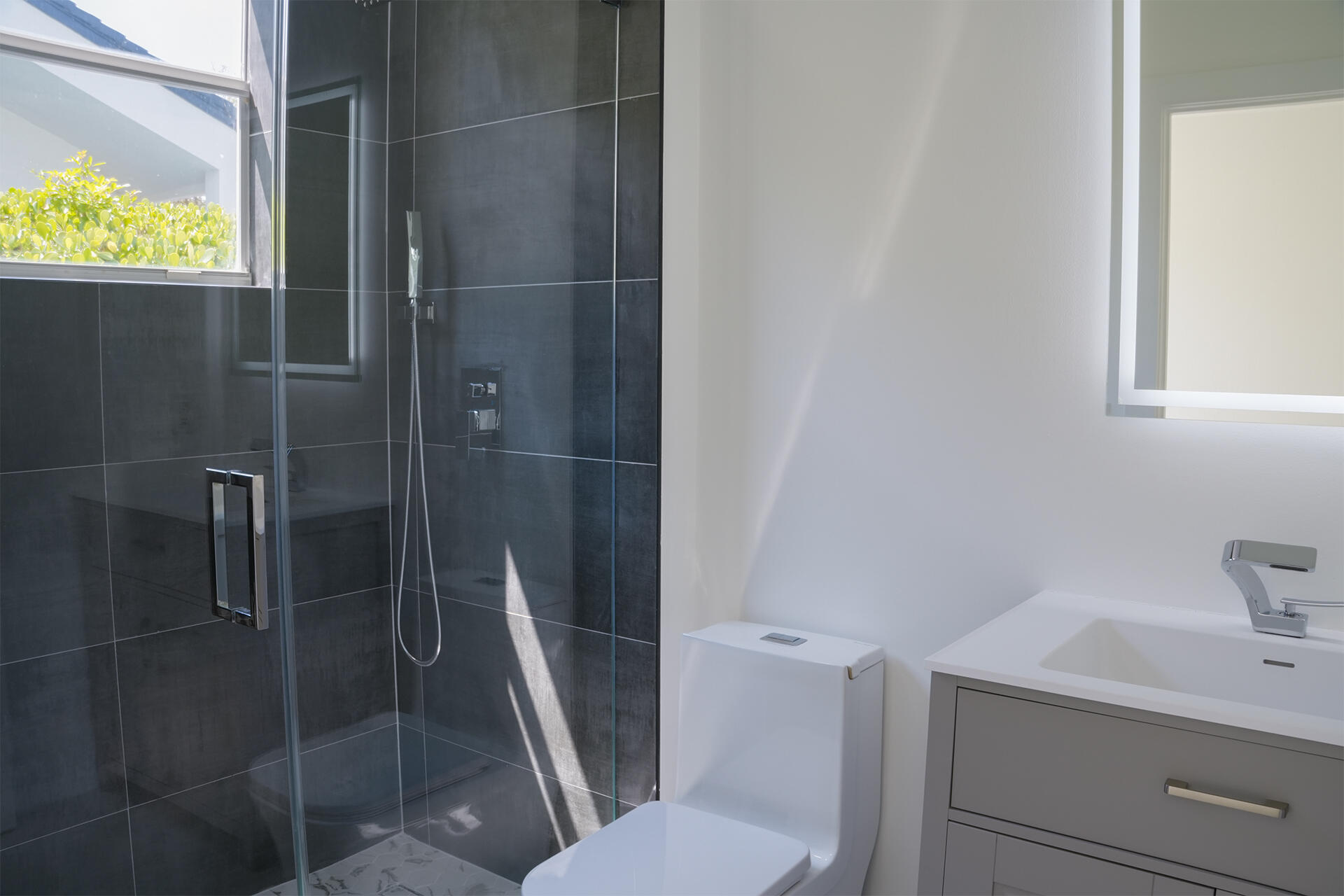5227 Southwest 195th Terrace Miramar, FL 33029 - Photo 51 of 58 a bathroom with a sink toilet and shower