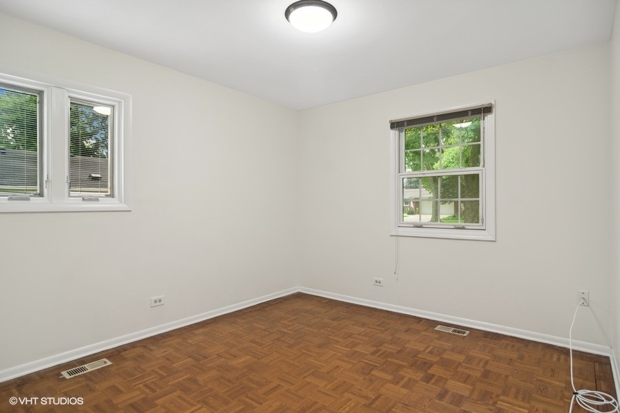 517 North Rohlwing Road Palatine, IL 60074 - Photo 12 of 17 an empty room with a window