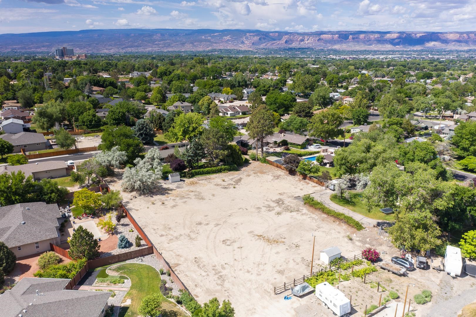 2663 G 3/8 Road Grand Junction, CO 81506 - Photo 3 of 6 an aerial view of a house with a yard