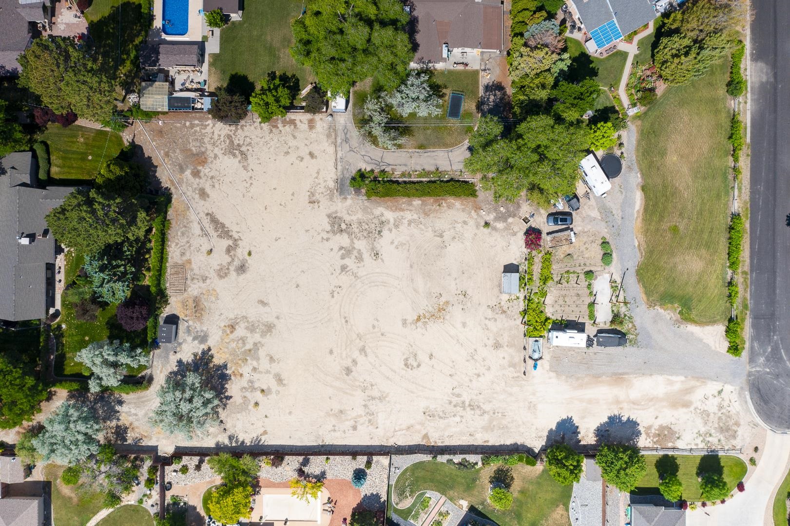2663 G 3/8 Road Grand Junction, CO 81506 - Photo 6 of 6 an aerial view of a wooden floor with a lake