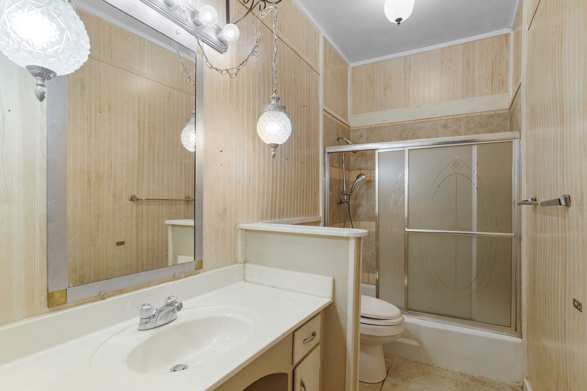 5118 Old Jackson Road Bells, TN 38006 - Photo 11 of 21 a bathroom with a sink toilet and shower