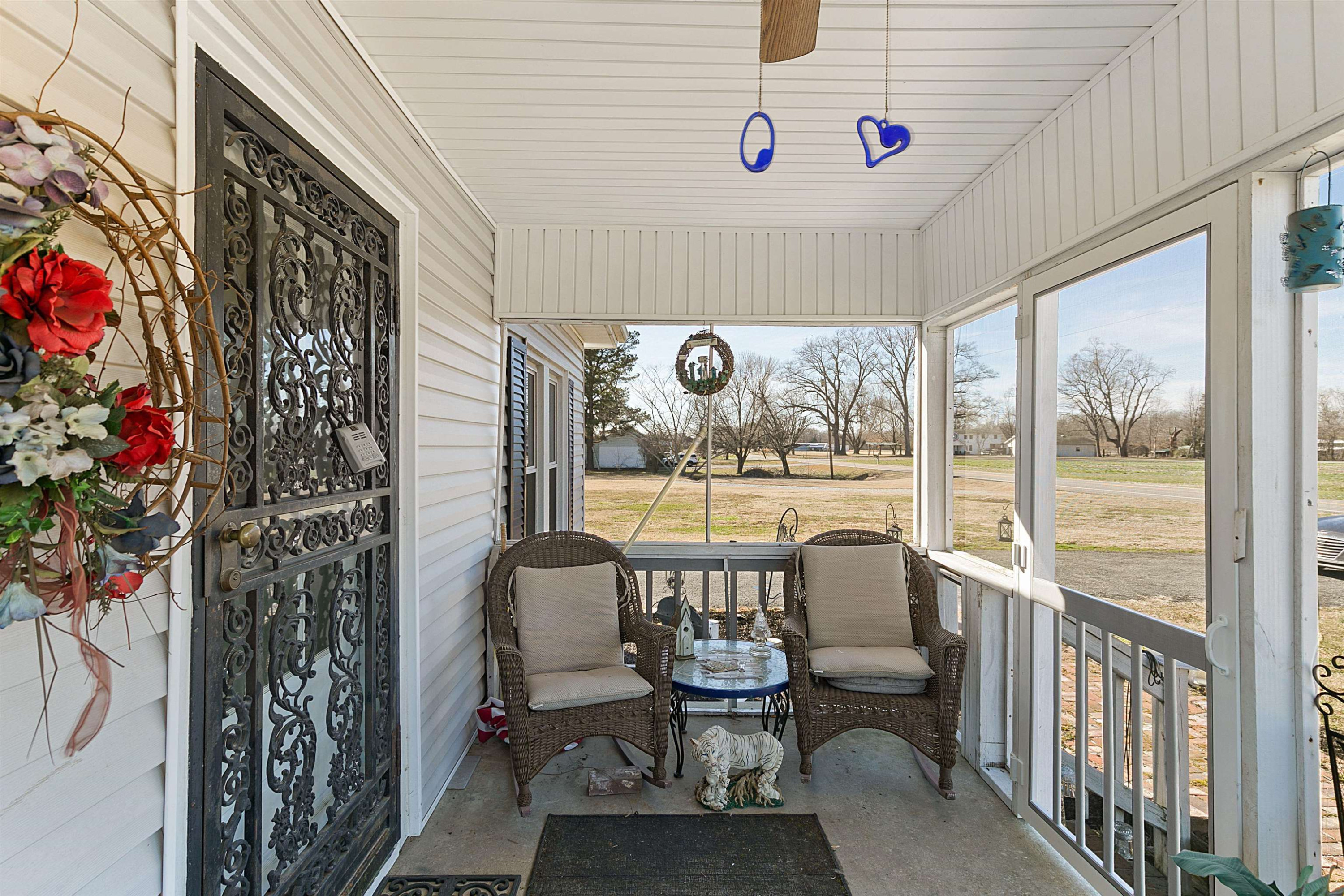 5118 Old Jackson Road Bells, TN 38006 - Photo 15 of 21 a dining room with furniture and a floor to ceiling window