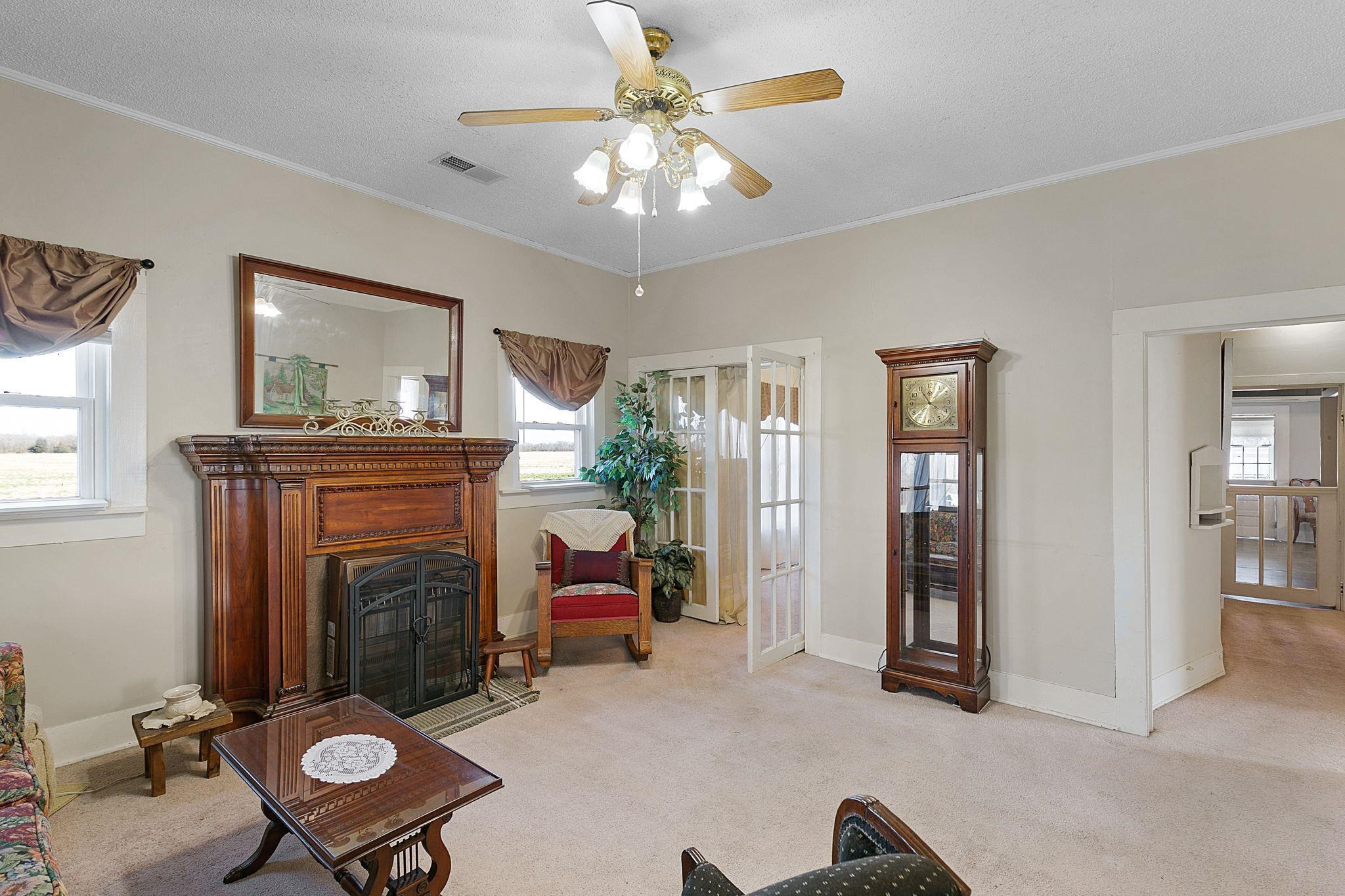 5118 Old Jackson Road Bells, TN 38006 - Photo 6 of 21 a living room with furniture and a fireplace