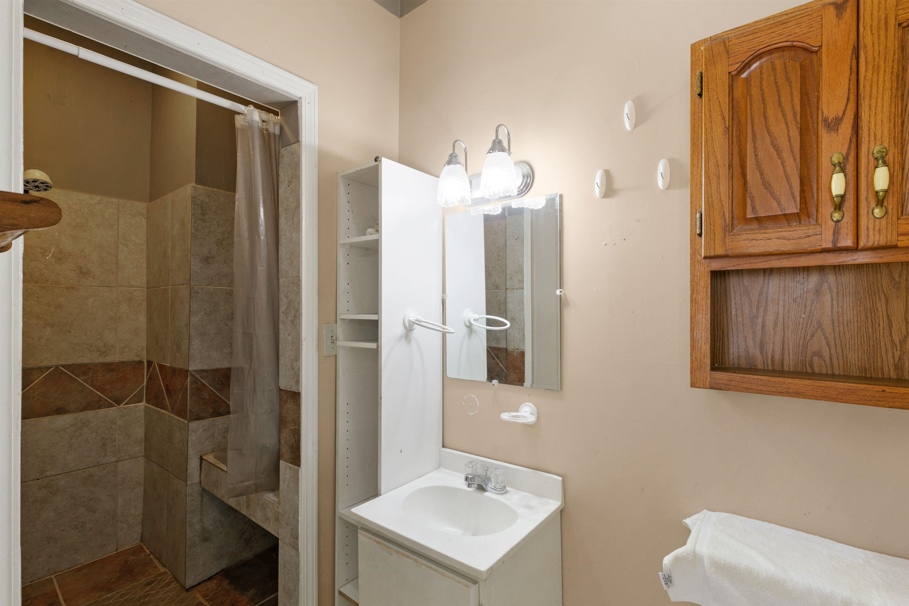 5118 Old Jackson Road Bells, TN 38006 - Photo 9 of 21 a bathroom with a sink a toilet and shower