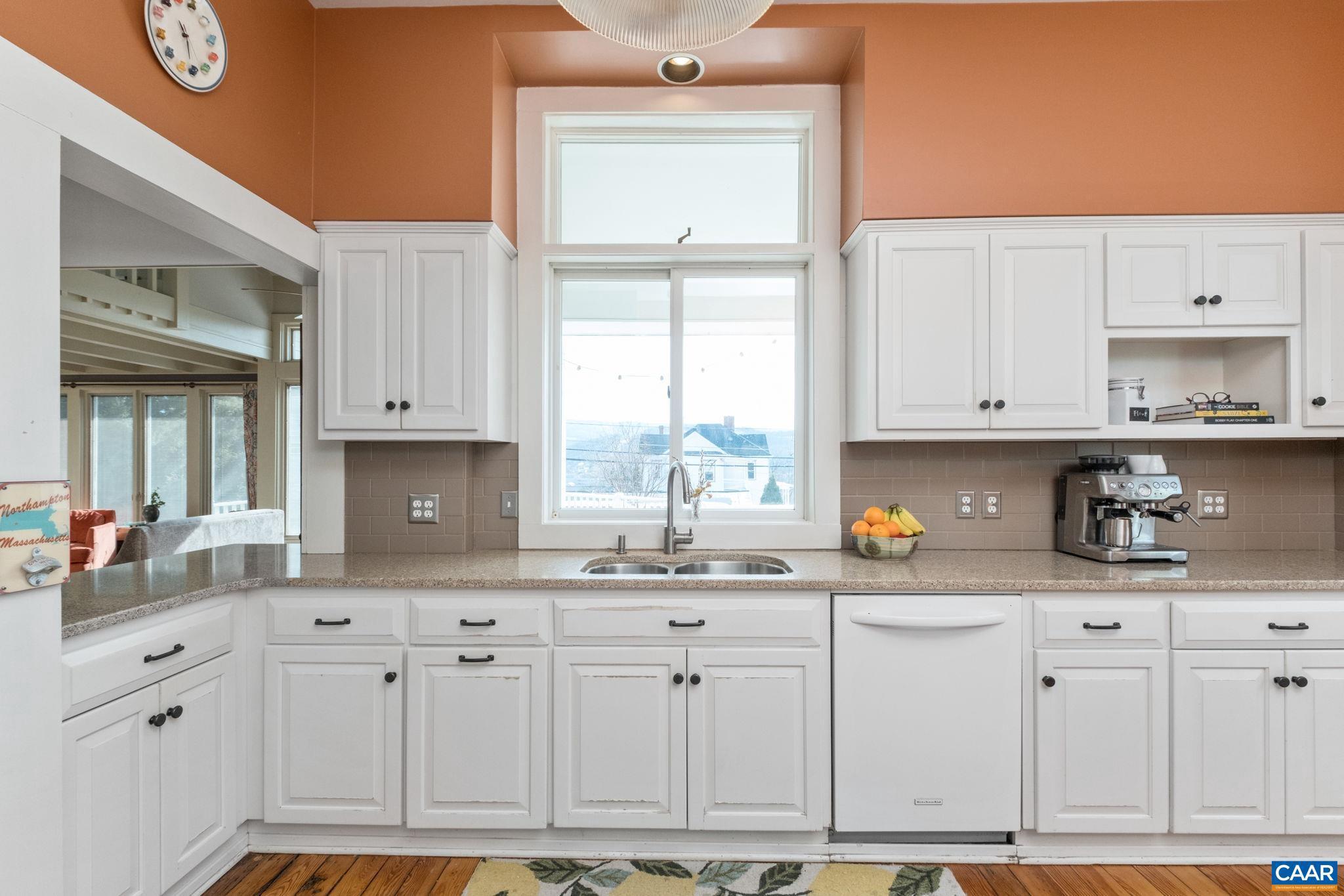 428 Maple Avenue Waynesboro, VA 22980 - Photo 12 of 69 a kitchen with cabinets appliances a sink and a window