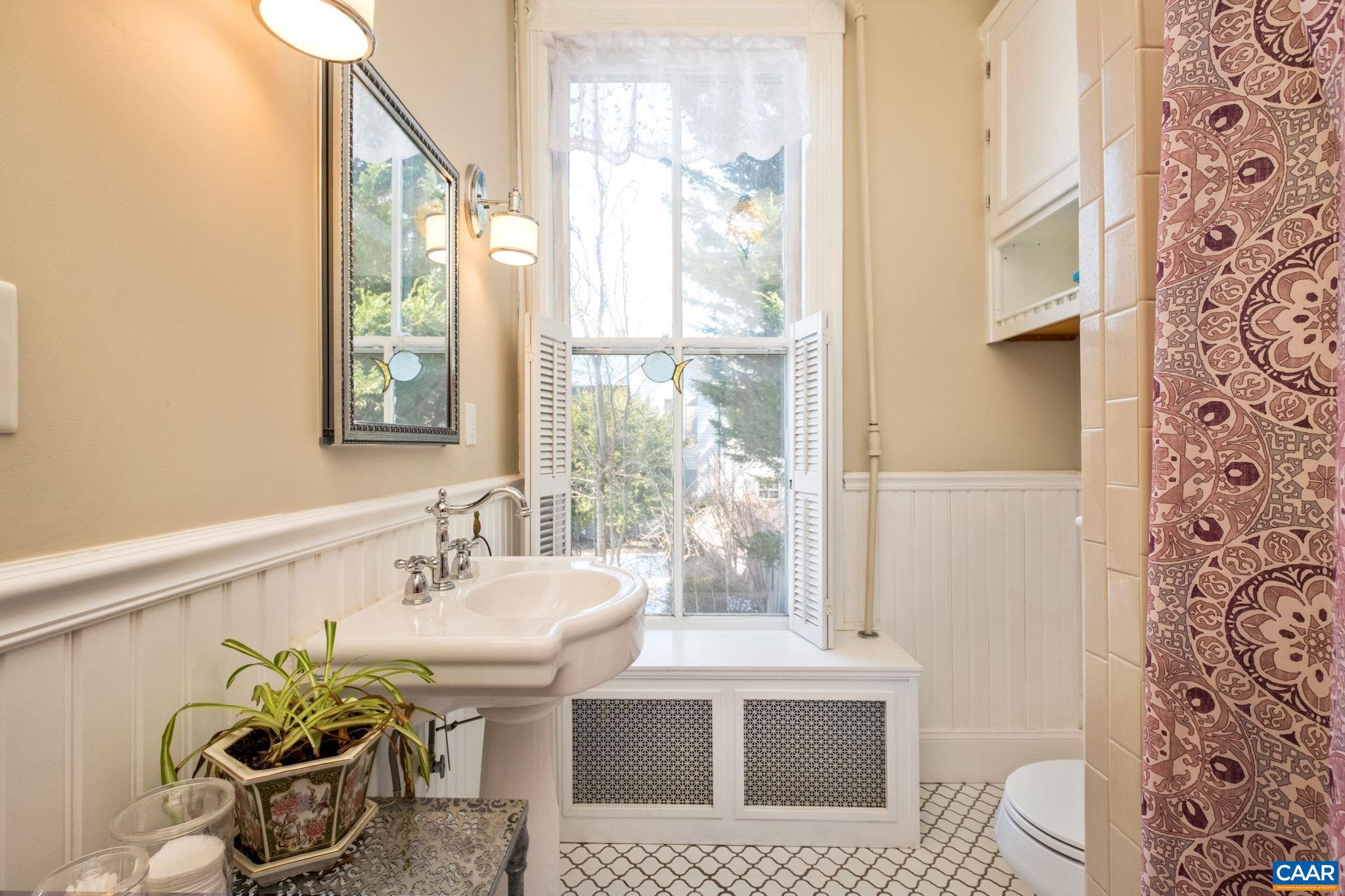 428 Maple Avenue Waynesboro, VA 22980 - Photo 29 of 69 a bathroom with a sink toilet and window