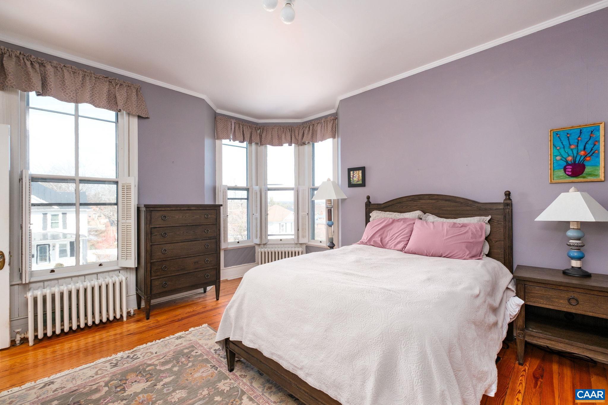 428 Maple Avenue Waynesboro, VA 22980 - Photo 34 of 69 a large bed sitting in a bedroom next to a window