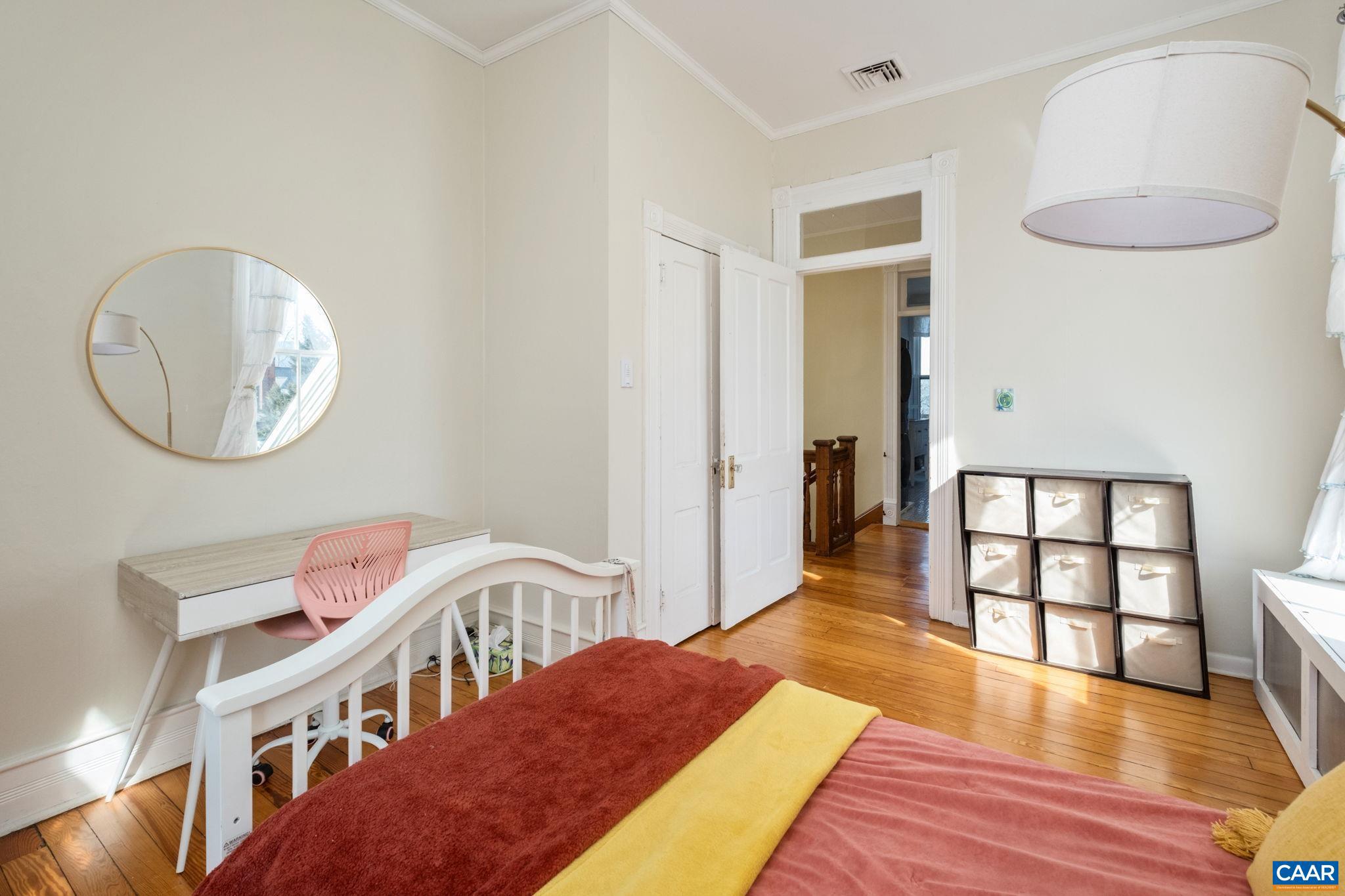 428 Maple Avenue Waynesboro, VA 22980 - Photo 41 of 69 a bedroom with furniture and a wooden floor