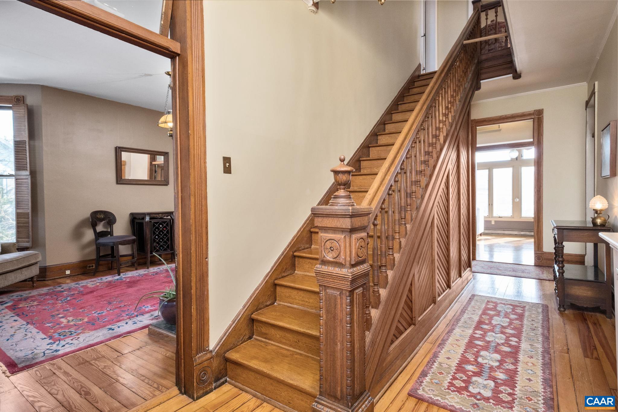 428 Maple Avenue Waynesboro, VA 22980 - Photo 9 of 69 a view of a hallway with wooden floor and staircase
