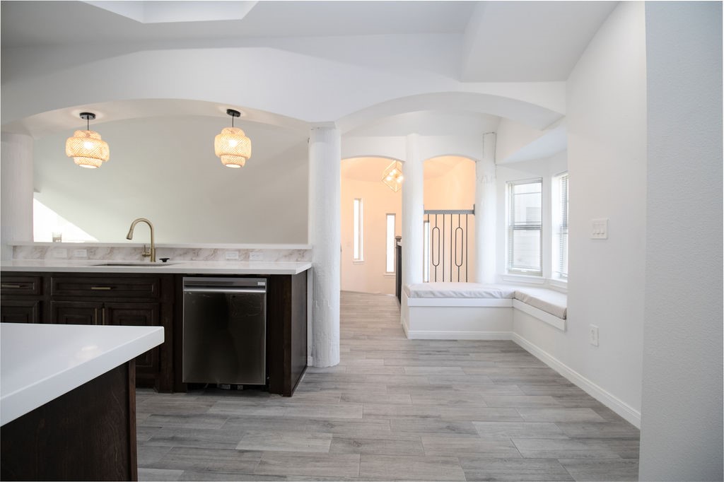 5201 Chapman Street Houston, TX 77009 - Photo 29 of 30 a kitchen with a sink and a fireplace