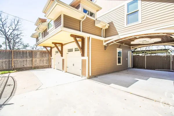 a view of a house with a garage