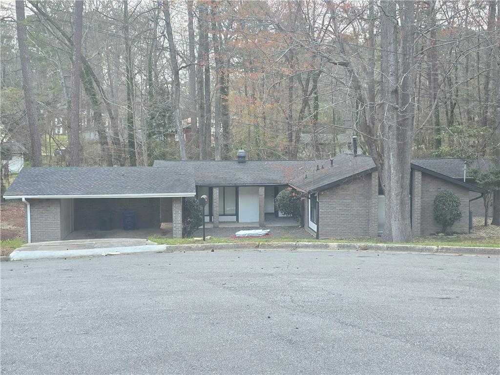 a view of house with a outdoor space