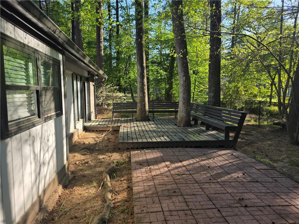 4055 Kelden Court Southwest Atlanta, GA 30349 - Photo 3 of 10 a view of outdoor space with deck and yard