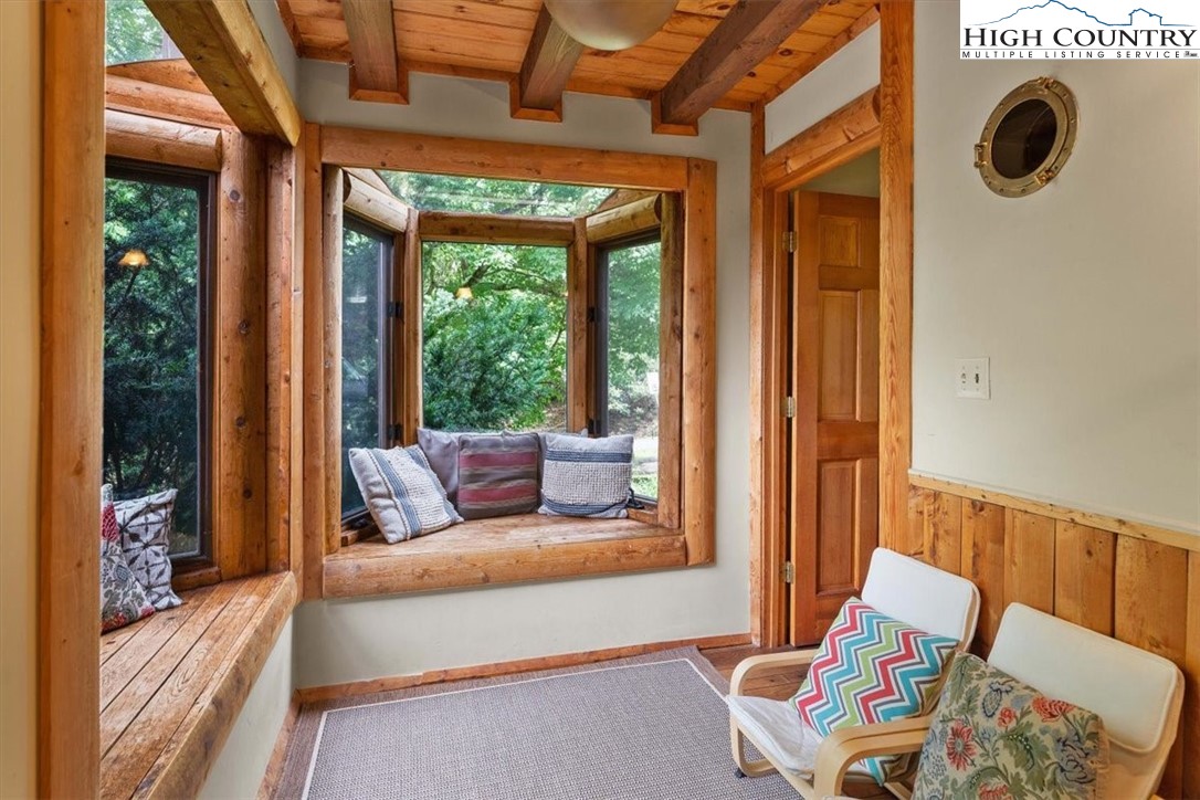 117 Chinkapin Ridge Road Seven Devils, NC 28604 - Photo 14 of 43 a living room with furniture and a window