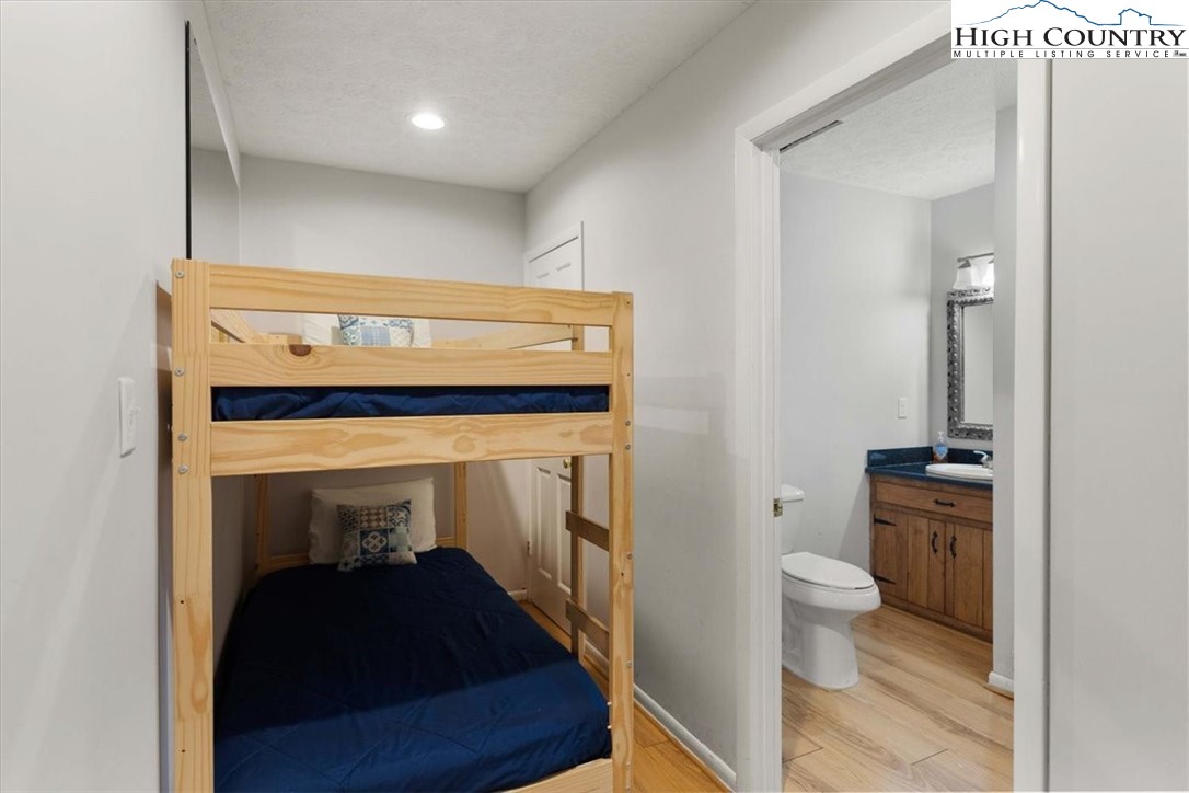 117 Chinkapin Ridge Road Seven Devils, NC 28604 - Photo 24 of 43 a bathroom with a toilet and a sink