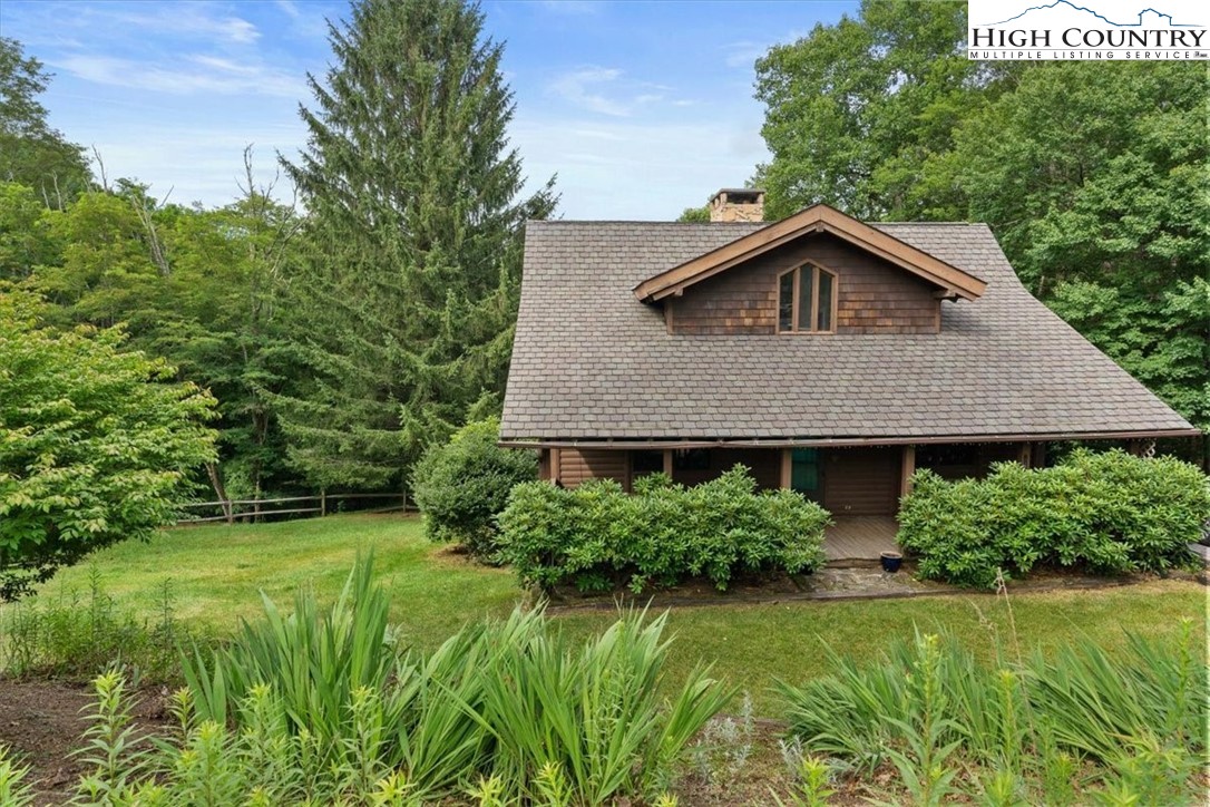 117 Chinkapin Ridge Road Seven Devils, NC 28604 - Photo 3 of 43 a aerial view of a house with a yard