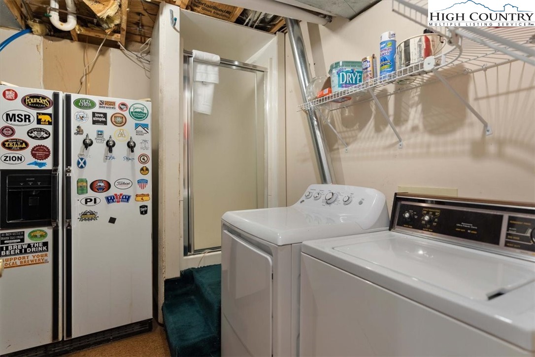 117 Chinkapin Ridge Road Seven Devils, NC 28604 - Photo 31 of 43 a utility room with dryer and washer