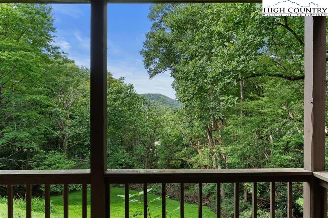 117 Chinkapin Ridge Road Seven Devils, NC 28604 - Photo 40 of 43 a view of a garden from a balcony