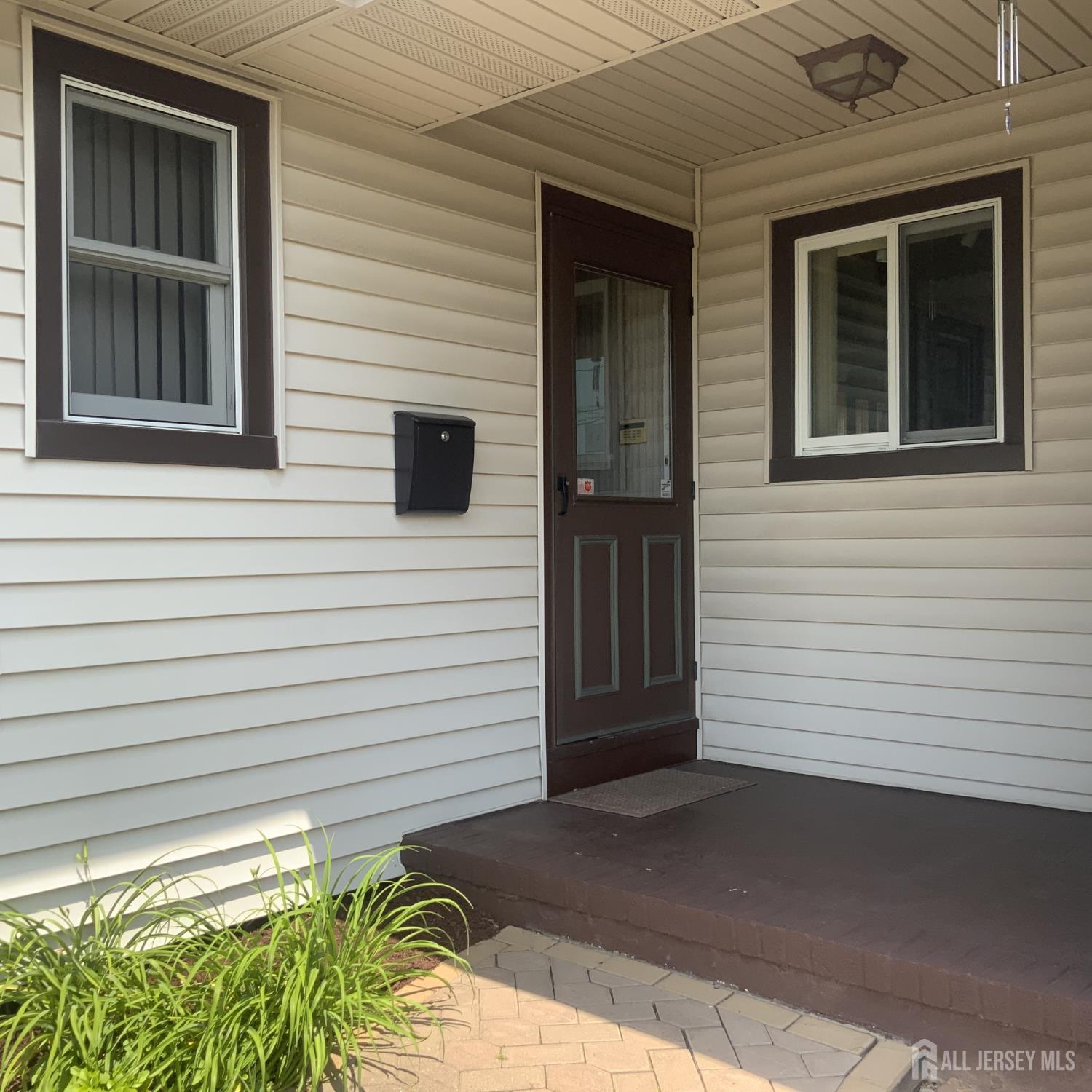 178 Willow Street Port Reading, NJ 07064 - Photo 3 of 15 a view of front door of house