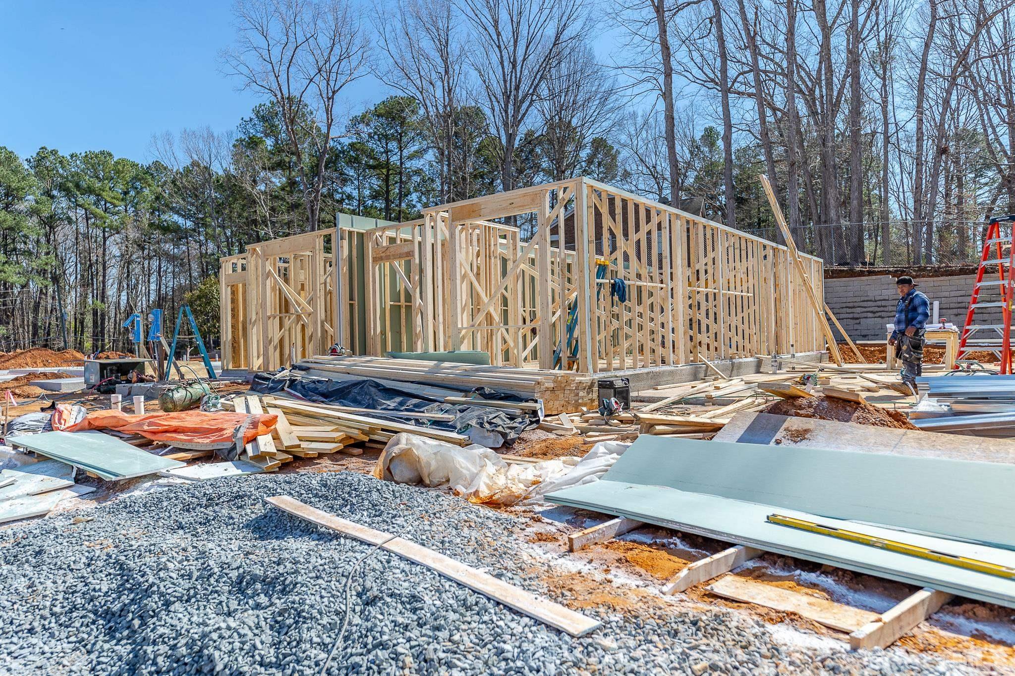 5705 Tall Pines Court Raleigh, NC 27609 - Photo 11 of 36 a view of swimming pool with chairs and wooden fence